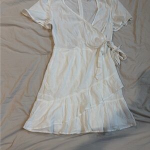 Women's White Wrap Dress with Ruffle Hem